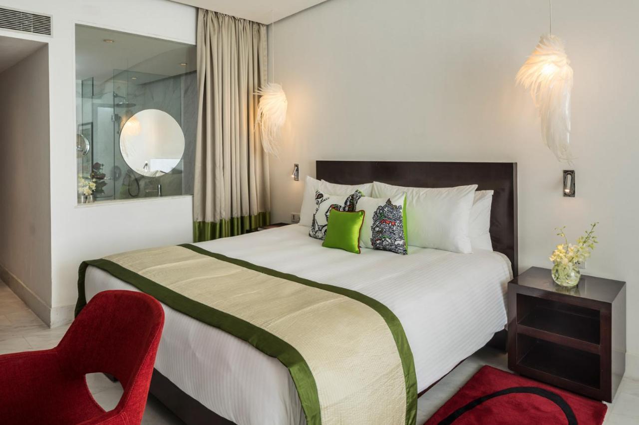The Park Chennai Hotel Bagian luar foto A bedroom at the hotel